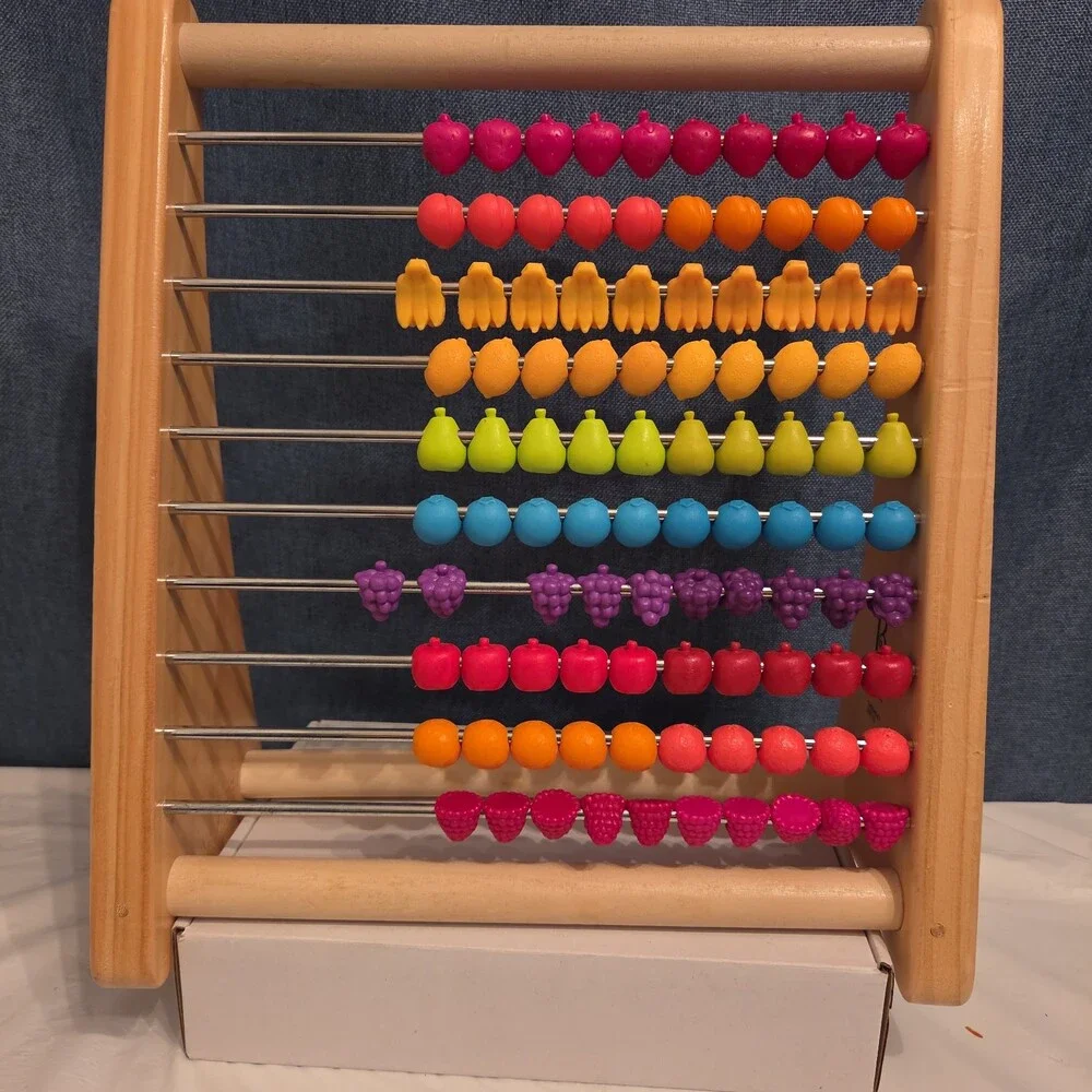 B. Toys Two-Ty Fruity Wooden Abacus Toy Textured Fruit Counting Math Board